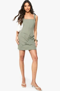Robe mini sans manches à détail d'ourlet enveloppant sur mesure