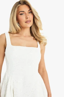 Robe mini skater en boucle ornée de sequins premium