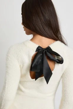 boohoo Robe Mini Tricotée Ultra Douce Avec Nœud Au Dos Pour Petite Taille<Femme Pulls Et Gilets|Toutes Les Mailles