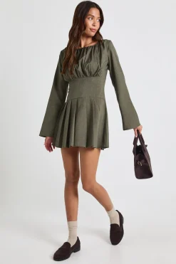 Robe patineuse plissée à manches longues et buste froncé