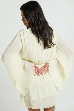 Robe Patineuse Plissée À Volants Et Décolleté Plongeant