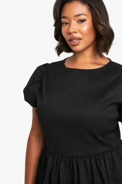 ROBE PATINEUSE STRUCTURÉE POUR TAILLES PLUS EN TISSU TEXTURÉ AVEC EFFET POMPON