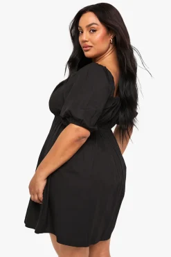 Robe skater en coton plissée avec nœud à l’avant