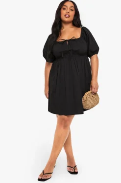 Robe skater en coton plissée avec nœud à l’avant