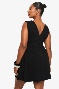 ROBE SKATER EN GRANDES TAILLES – DÉTAILS DE NOEUD, DÉCOLLETAGE PLONGÉ, CORSET