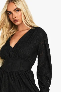 Robe skater à manches longues en burnout floral