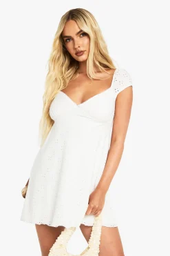 Robe smock en broderie anglaise à manches cap