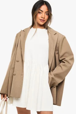 Robe smock en coton à ourlet incurvé