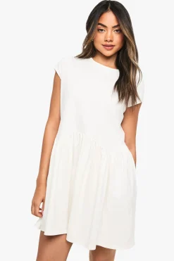 Robe smock en coton à ourlet incurvé