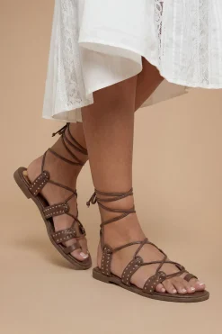 Sandales Plates Carla En Synthétiquecuir À Clous Avec Lacets Montants