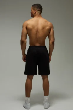 Short Baggy 7 Pouces Avec Logo Training Dept En Relief