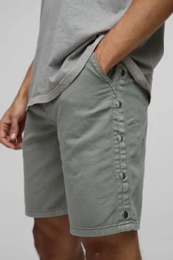 Short à coupe décontractée en sergé surteinté, ourlet boutonné