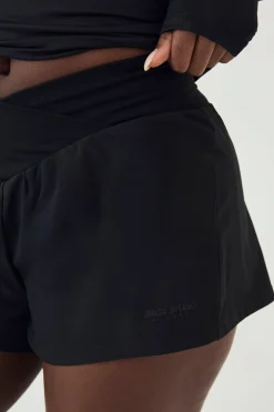 Short de Course DSGN Studio à Taille Portefeuille