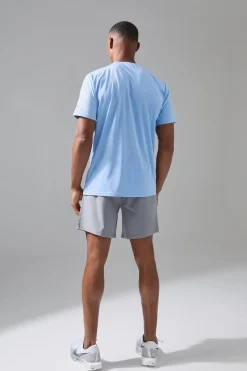 Short de gym homme extensible en tissu tissé, coupe régulière, longueur 7 pouces