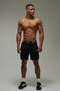 Short de gym pour homme, stretch actif, tissé, coupe régulière, entrejambe de 7 pouces
