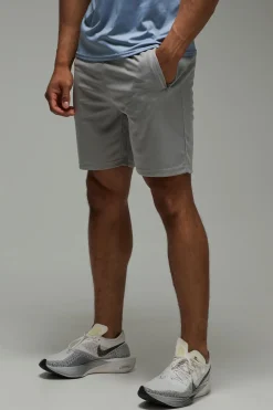 Short de gym stretch actif pour homme à poches zippées, 7 pouces