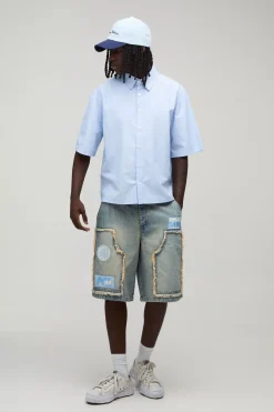 Short En Jean Moto Brut Coupe Charpentier Avec Bords Effilochés