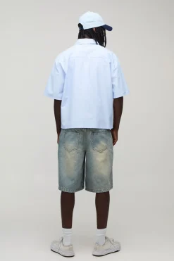 Short En Jean Moto Brut Coupe Charpentier Avec Bords Effilochés