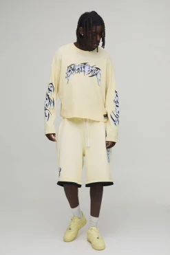 boohooMAN Short En Jersey Délavé Coupe Oversize Avec Graphisme Graffiti<Homme Jorts|Denim
