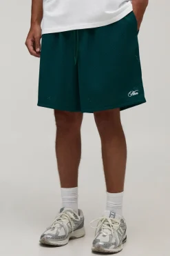 Short En Jersey Mesh Ample Homme Avec Inscription