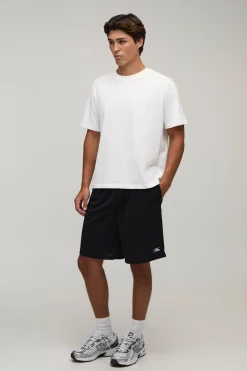 Short En Jersey Mesh Coupe Baggy Homme Avec Inscription