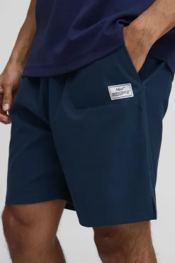 Short en Toile Canvas Décontracté à Taille Élastique avec Patte Tissée