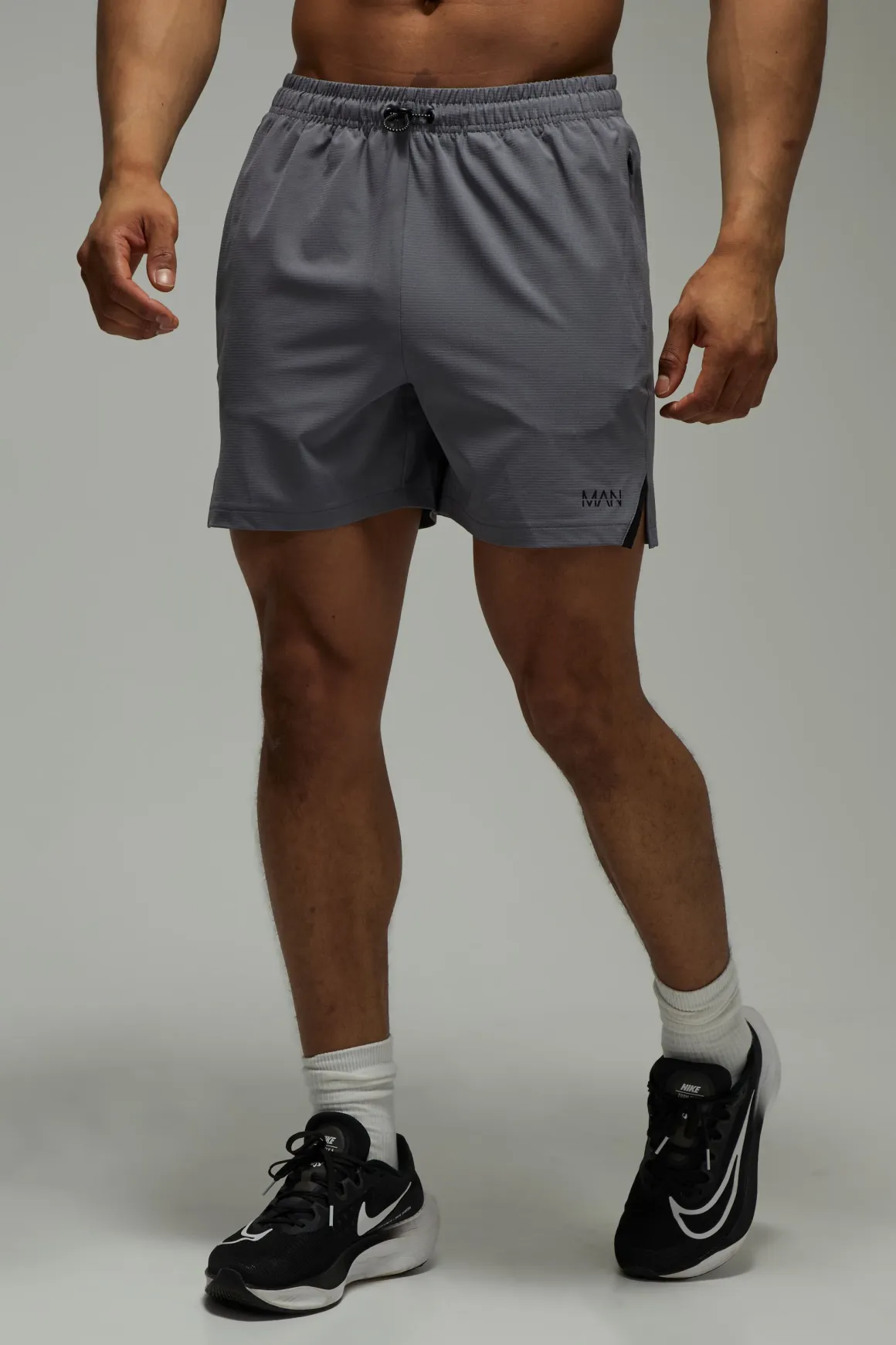 Short Homme 7 Pouces Extensible Tissé Avec Ajusteur Élastique