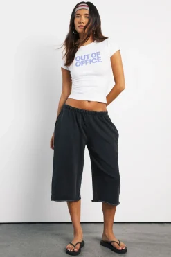 Short Jogger 3/4 Taille Basse À Ourlet Brut Et Finition Bouclette Délavée
