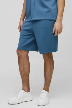 Short large à taille élastiquée