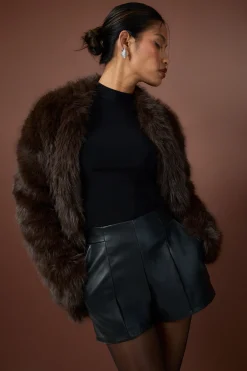 Shorts ajustés en synthétique