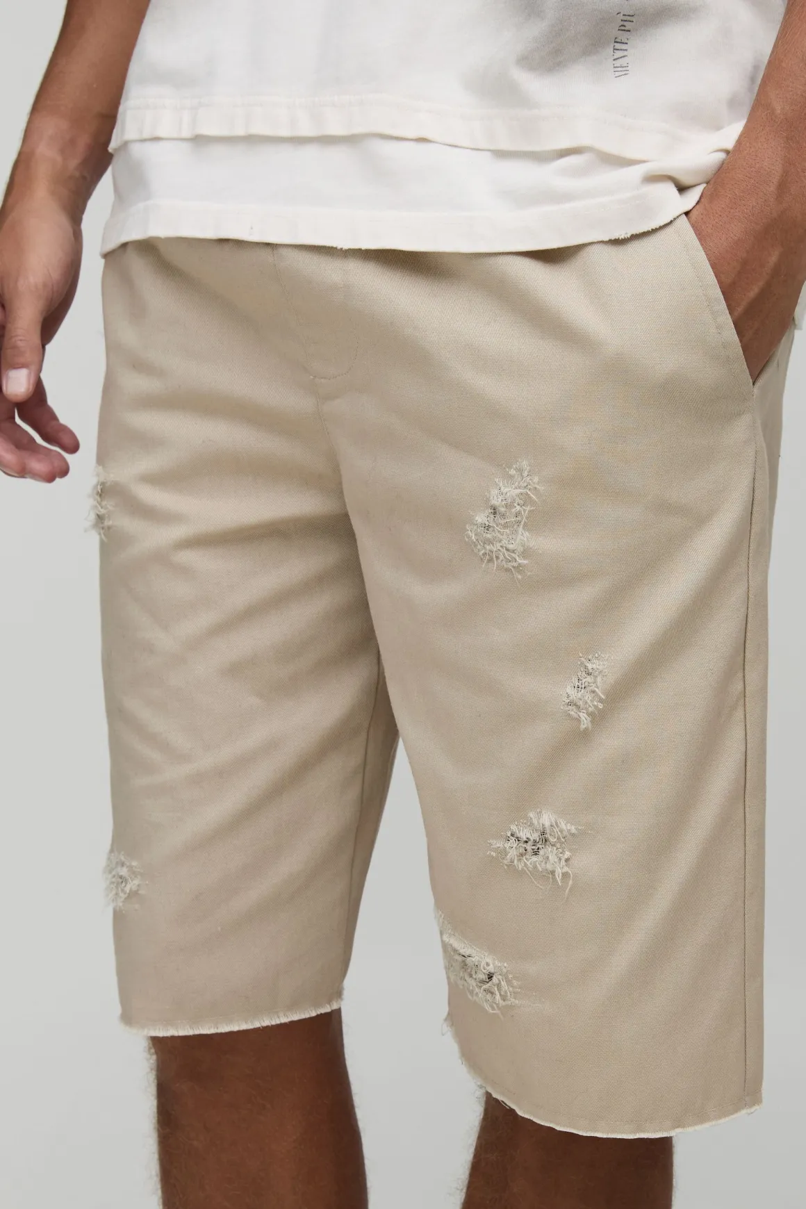 Shorts ample à la coupe décontractée, distressed, à ourlet brut