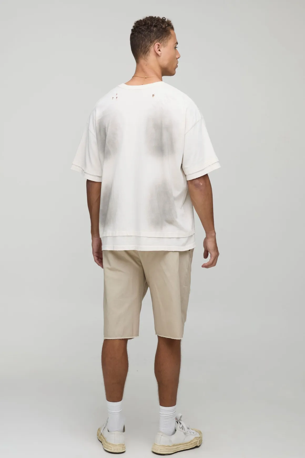 Shorts ample à la coupe décontractée, distressed, à ourlet brut