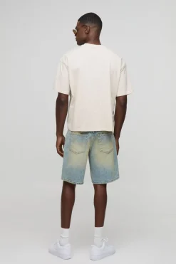 Shorts en denim à coupe décontractée, extrême délavé avec finition à l'ourlet brut