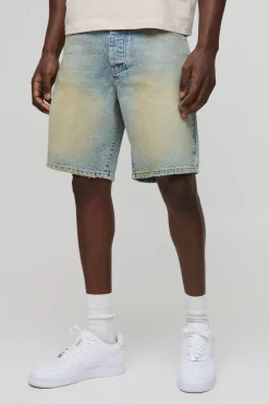 Shorts en denim à coupe décontractée, extrême délavé avec finition à l'ourlet brut