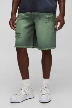 Shorts en denim déchiré à teinte verte, coupe décontractée