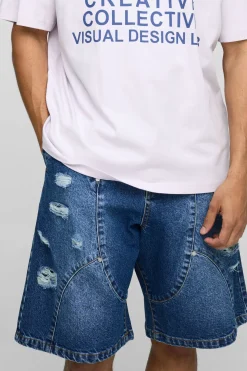 Shorts en denim délavé style parachute avec panneaux déchirés