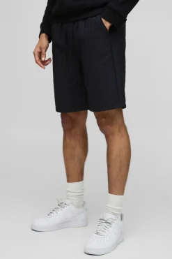 Shorts en nylon matelassé, coupe décontractée à taille élastiquée