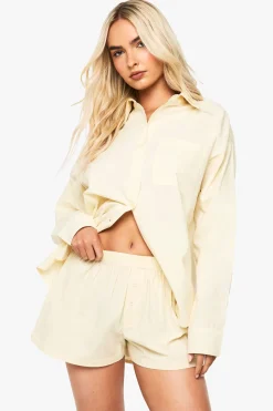 Shorts en popeline de coton à boutons sur le devant