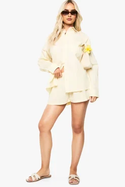 Shorts en popeline de coton à boutons sur le devant