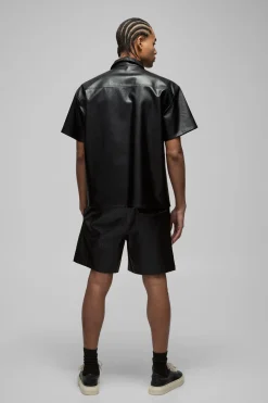 Shorts en synthétique à motif damier, taille élastiquée, coupe décontractée
