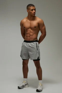 Shorts 2-en-1 tissés stretch pour homme Active