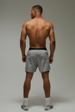 Shorts 2-en-1 tissés stretch pour homme Active