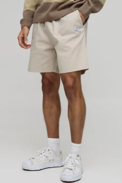 Shorts en toile à taille élastiquée, coupe décontractée avec onglet tissé
