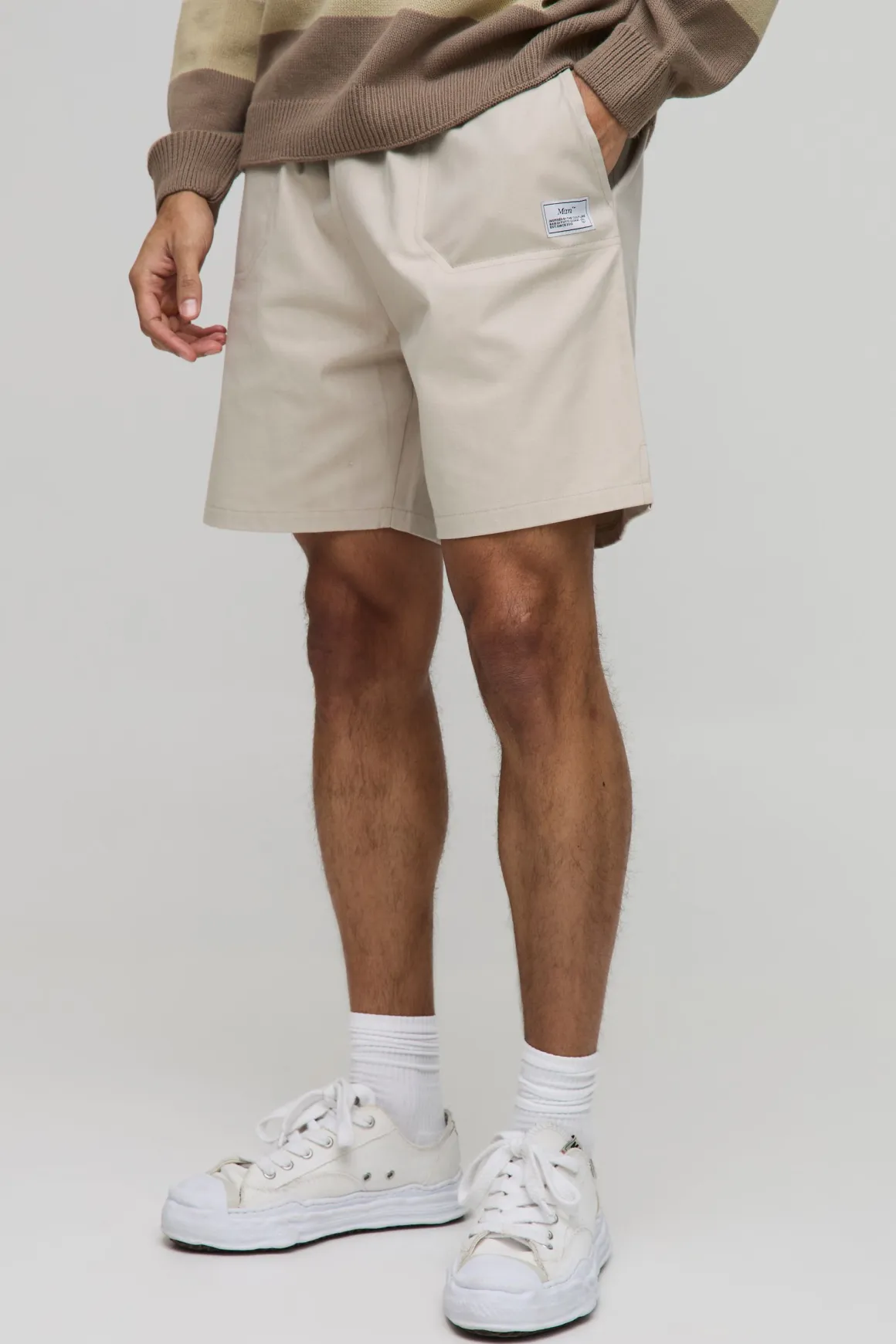 Shorts en toile à taille élastiquée, coupe décontractée avec onglet tissé