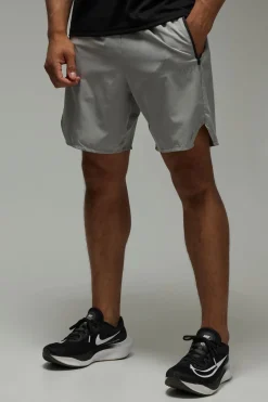 Shorts homme actif perforé stretch tissé 7 pouces