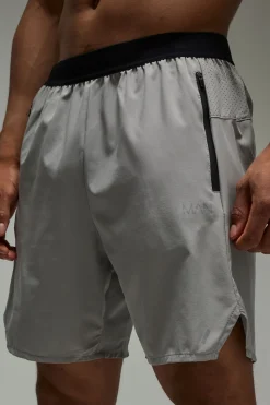 Shorts homme actif perforé stretch tissé 7 pouces