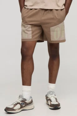 Shorts imprimés à taille élastique, coupe boxer.