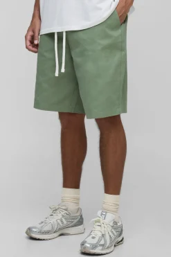 Shorts longs à taille élastiquée et coupe ample
