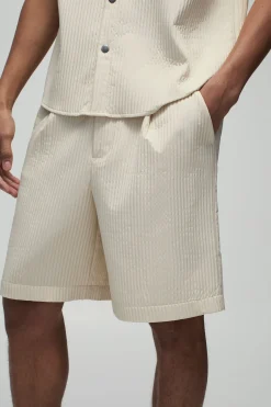 Short technique oversize plissé à ceinture partiellement fixe