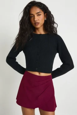 Skort ajusté à détails drapés